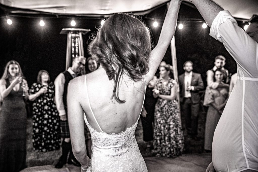 redhead bride performs first dance with her husband at hertfordshire wedding, best photographers