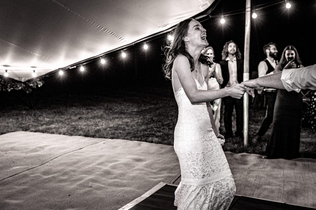 redhead bride performs first dance with her husband at hertfordshire wedding
