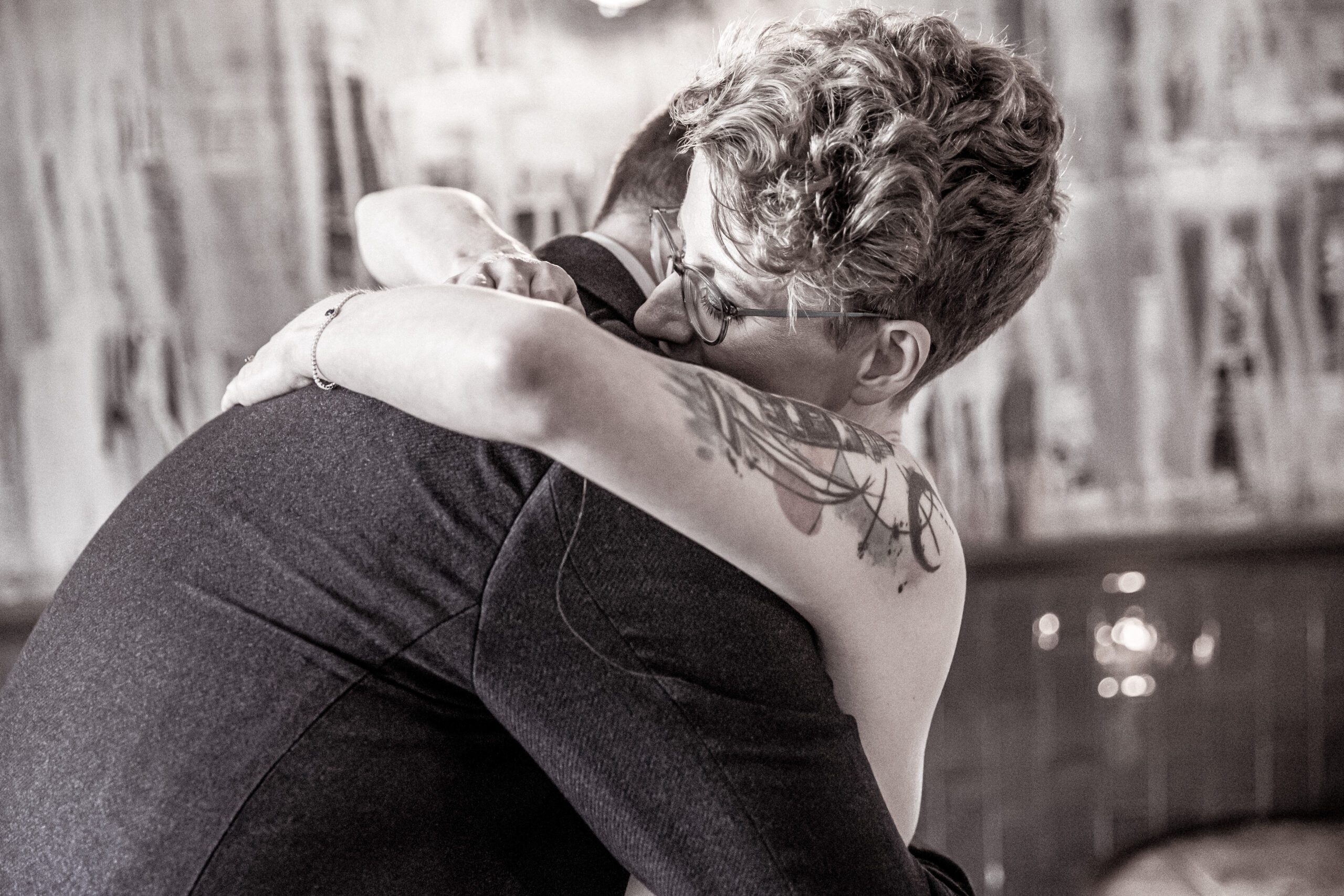 The bride hugs her new husband as the ceremony finishes at Balfour st barts.