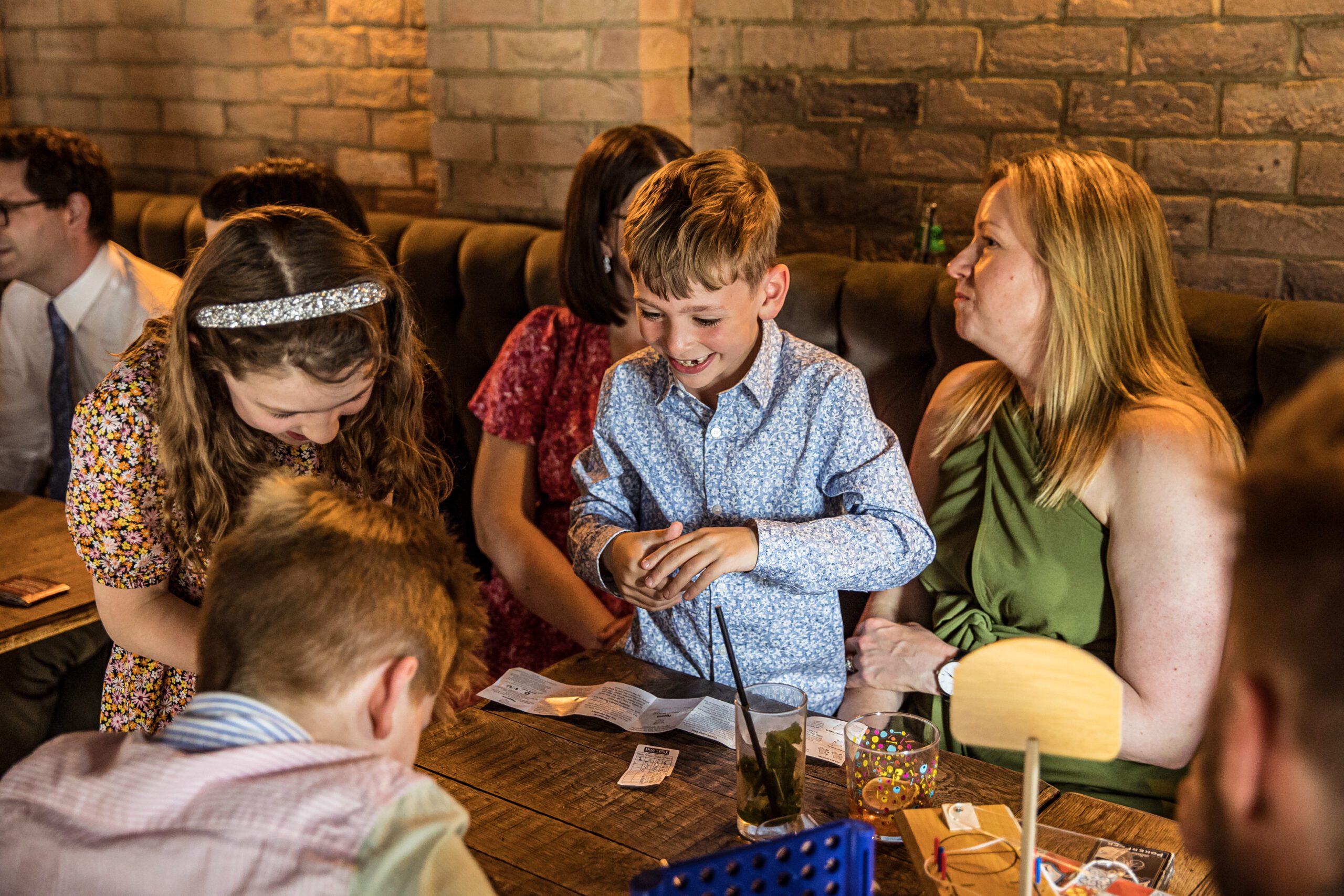 Children play card at a London Pub Wedding at Balfour St Barts